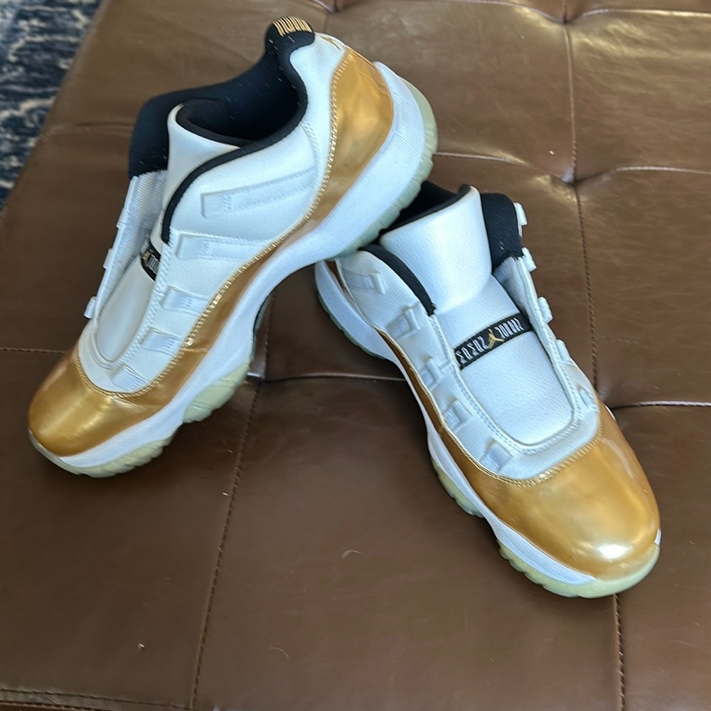 Metallic gold and white air jordan 11